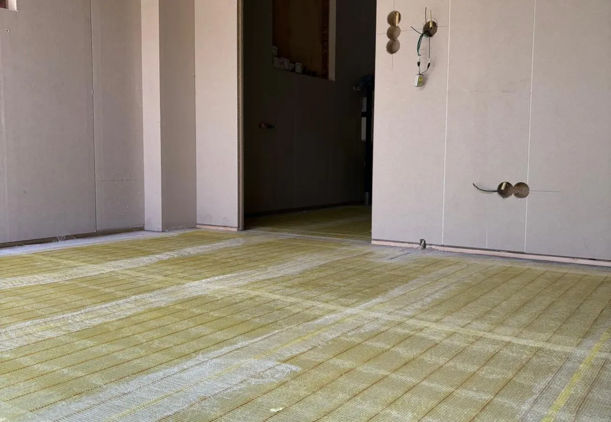 Elektrische vloerverwarming levensloopbestendige woning garage